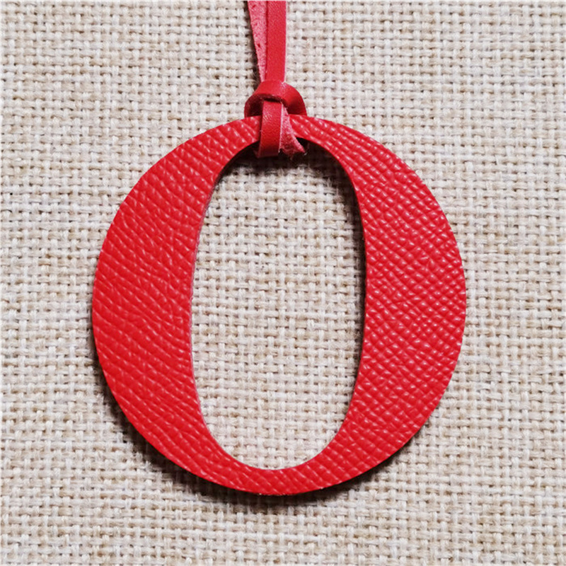 Chaveiro de couro natural genu - Monogram Keychain Leather avaliação e preço